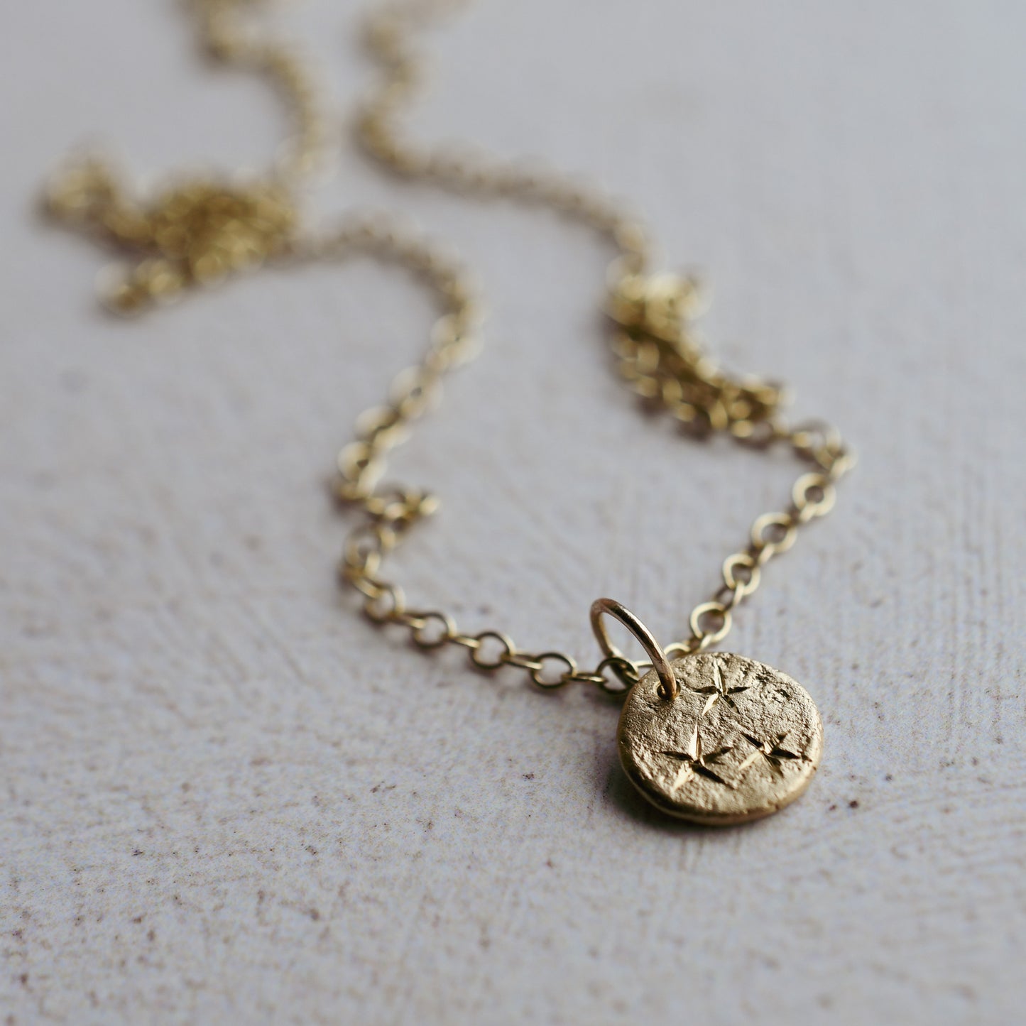 Ember 9 Carat Gold Star-Engraved Pendant