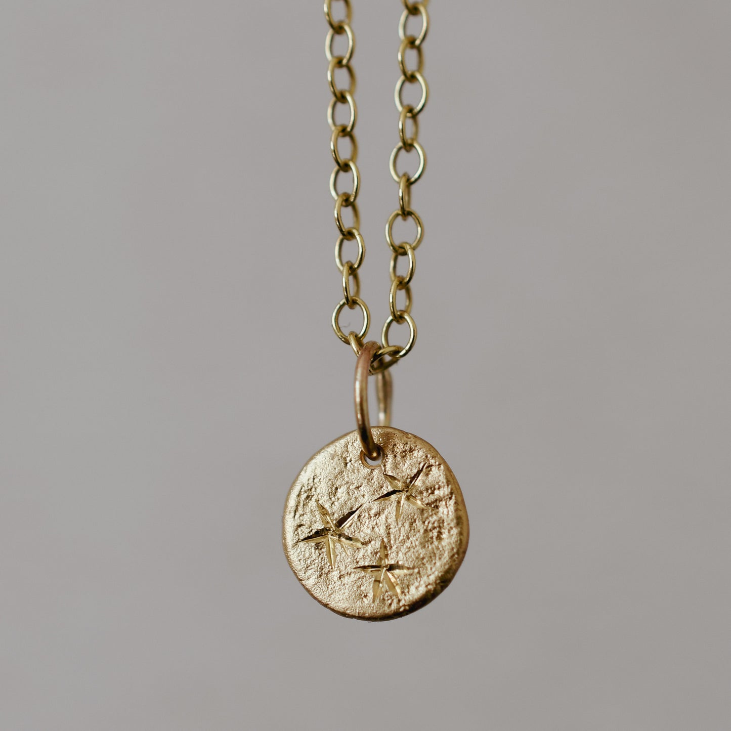 Ember 9 Carat Gold Star-Engraved Pendant