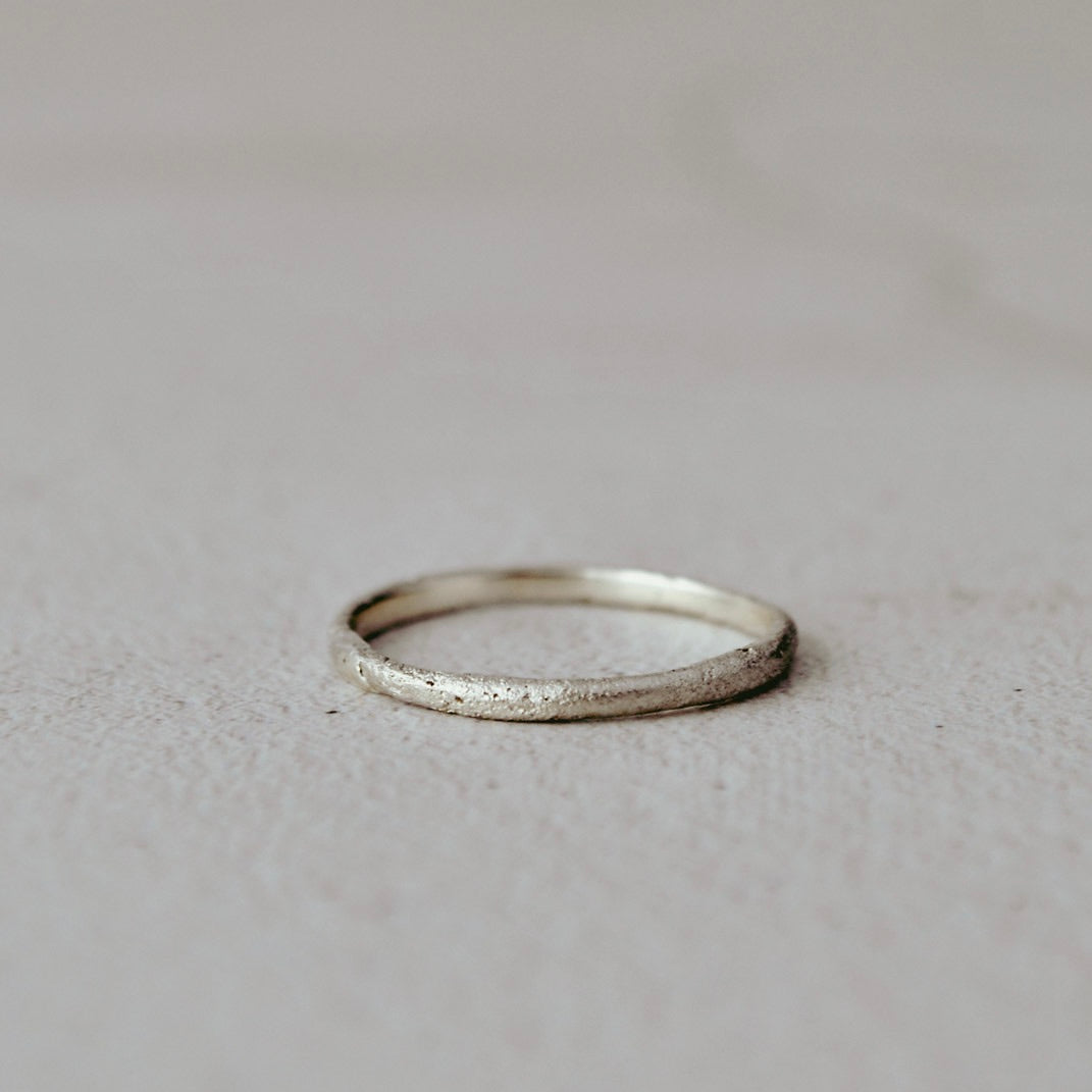 Raw textured wedding ring 1.8mm wide
