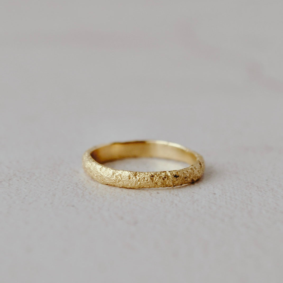 Raw textured wedding ring 3mm wide
